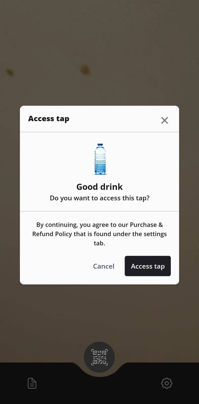 The app asking the customer to confirm access to a tap.