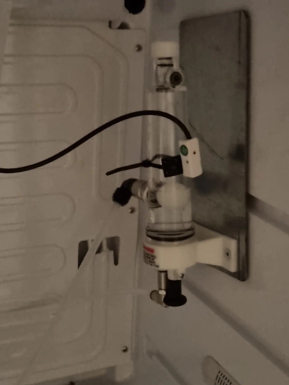 A flow meter fitted inside the machine plumbing.